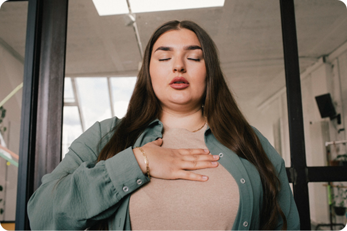 Woman using 5-5-5 breathing technique